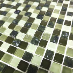 Close-up on the green glass and marble stone mosaic shower tile mix. Professional texture and quality guaranteed.