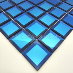 Beveled blue mirror mosaic used as a luxurious wall covering behind a kitchen backsplash.