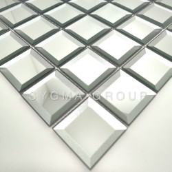 Detail of the Meghan faceted mirror glass mosaic, illustrating the brilliance and quality of the wall covering's bevel.
